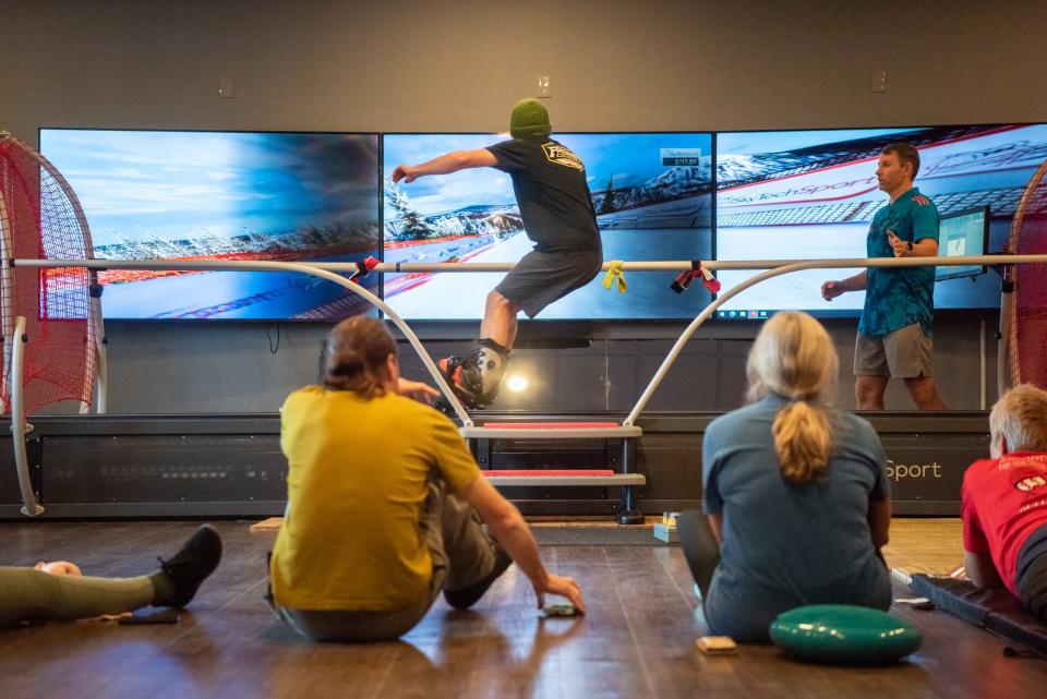 Clayton Ayers, a training supervisor and snowboard technical director at Blue Mountain Resort, tries out the virtual simulator, on Thursday, October 27, 2022, at 4SeasonAlpine, a new indoor ski and snowboard school in Doylestown Borough.