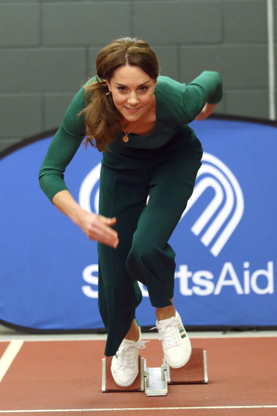 Britain's Catherine, Duchess of Cambridge, tries out the running track with starting blocks during a SportsAid event at the London Stadium in east London on February 26, 2020. (Photo by Yui Mok / POOL / AFP) (Photo by YUI MOK/POOL/AFP via Getty Images)