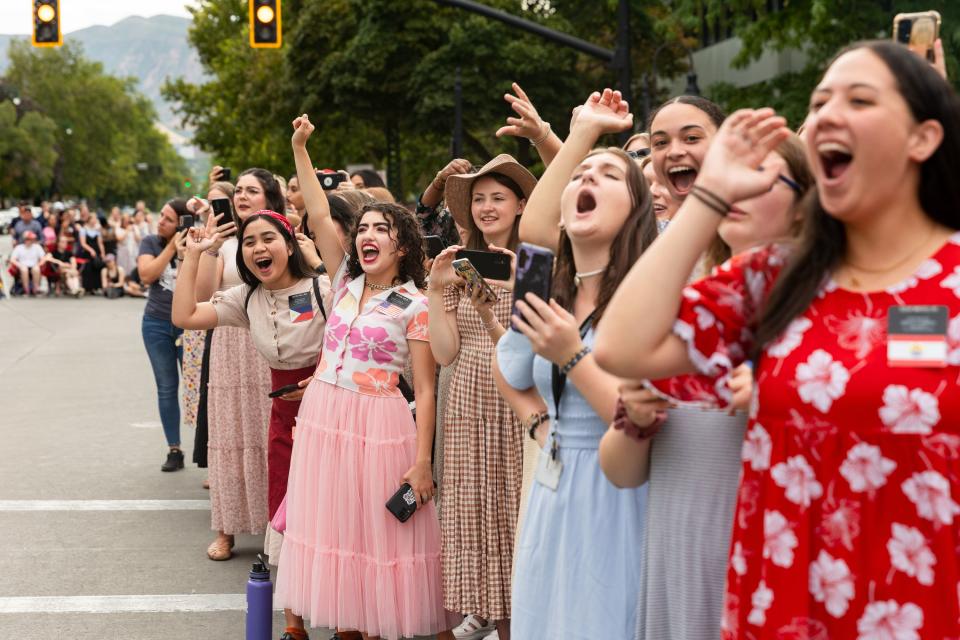 Sister missionaries from The Church of Jesus Christ of Latter-day Saints cheer on the parade participants during the annual Days of ’47 Parade in Salt Lake City on Monday, July 24, 2023. | Megan Nielsen, Deseret News