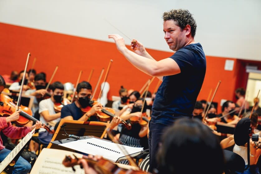 Inglewood, CA- July 30, 2022: Gustavo Dudamel leads rehearsal at the Judith and Thomas L. Beckmen YOLA Center for his upcoming performance at the Hollywood Bowl. The Encuentros Orchestra is made up of young musicians from 22 different countries. CREDIT: (Justin Katigbak/ For The Times)