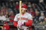 Cincinnati Reds' Jake Fraley prepares for an at bat against the Arizona Diamondbacks during the first inning of a baseball game Wednesday, May 15, 2024, in Phoenix. (AP Photo/Darryl Webb)
