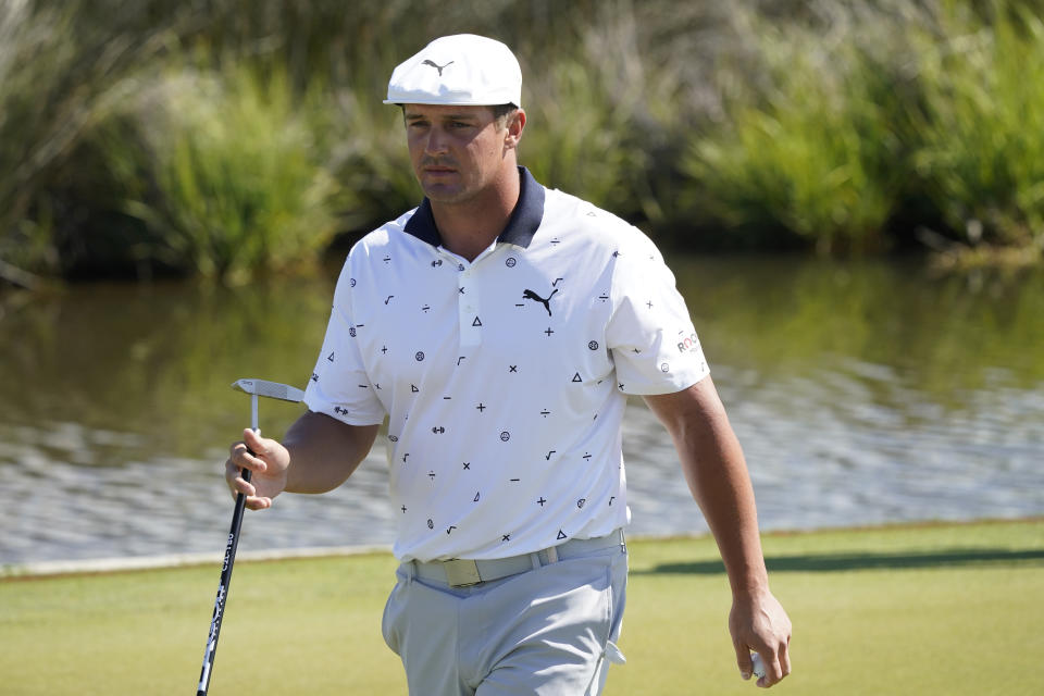 Bryson DeChambeau walks off the 13th green during the first round of the PGA Championship golf tournament on the Ocean Course Thursday, May 20, 2021, in Kiawah Island, S.C. (AP Photo/Matt York)