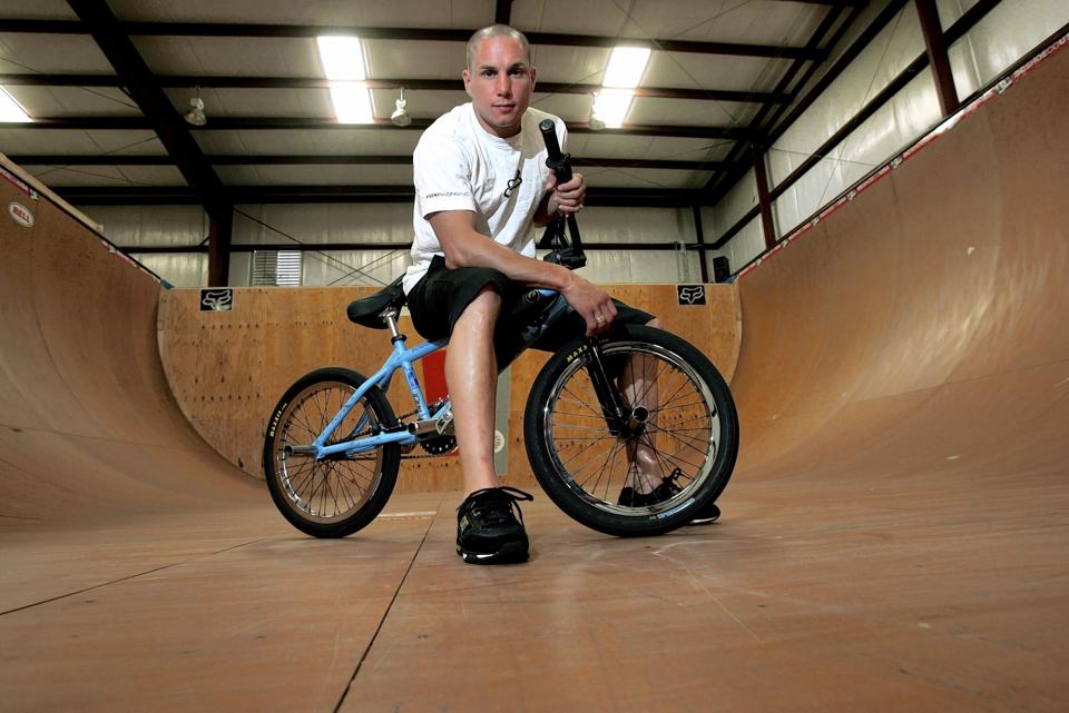 <p>Dave Mirra, a prominent figure in the world of BMX biking (he earned 24 medals at the X-Games), committed suicide on February 4 at age 41. Mirra was later diagnosed with chronic traumatic encephalopathy, most often associated with football players, and believed to be caused by repeated hits to the head. —(Pictured) X-Games athlete Dave Mirra poses in the half-pipe at his training facility in Greenville, N.C. in 2005. (AP Photo/Gerry Broome, File) </p>