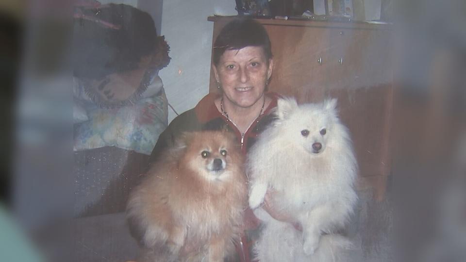 Beverly Register and her two dogs.