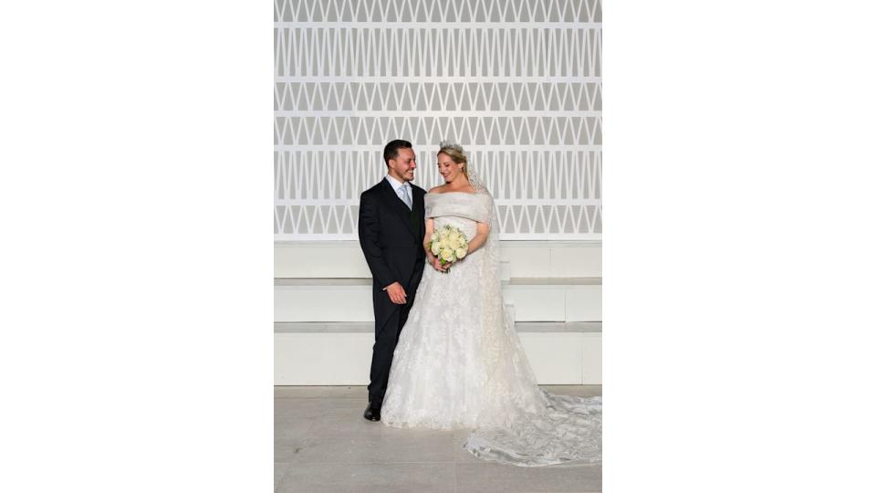 couple posing on wedding day