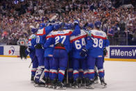 Slovakian players celebrate at the end of the preliminary round match between United States and Slovakia at the Ice Hockey World Championships in Ostrava, Czech Republic, Monday, May 13, 2024. (AP Photo/Darko Vojinovic)