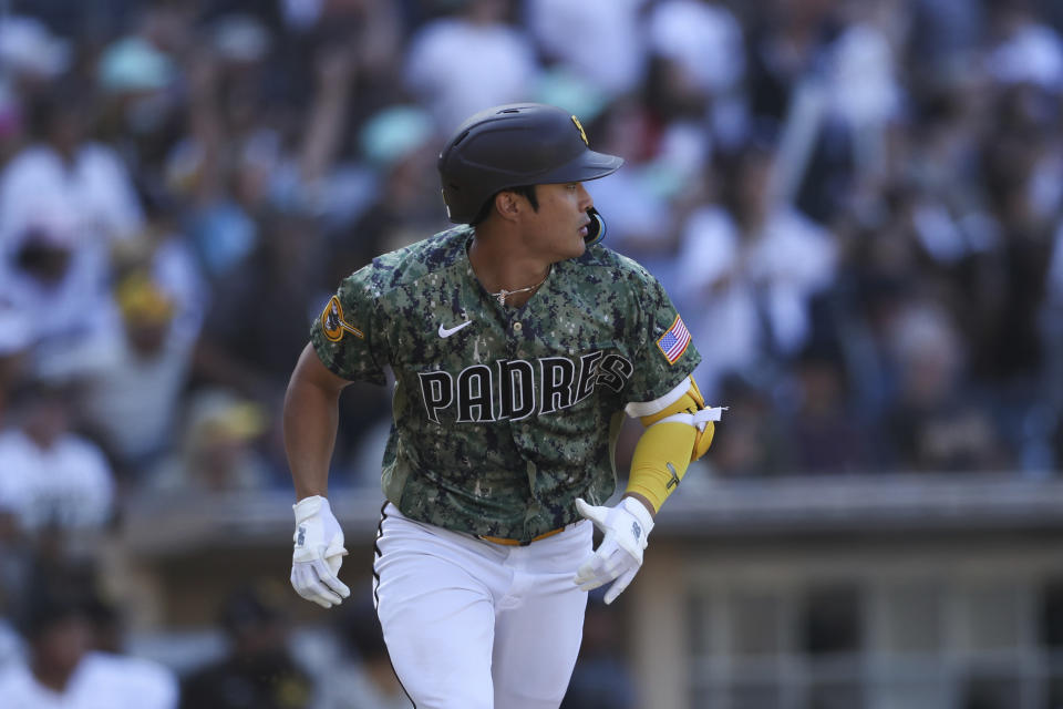 San Diego Padres' Ha-Seong Kim watches his solo home run against the Chicago White Sox in the seventh inning of a baseball game, Sunday, Oct. 2, 2022, in San Diego. (AP Photo/Derrick Tuskan)