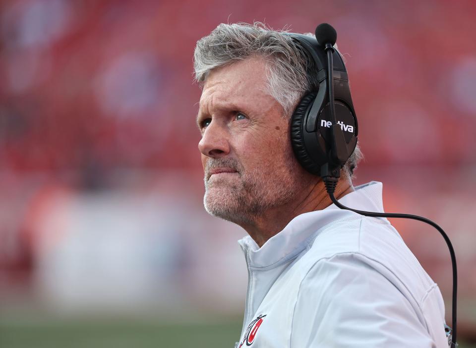 Utah Utes head coach Kyle Whittingham watches the clock