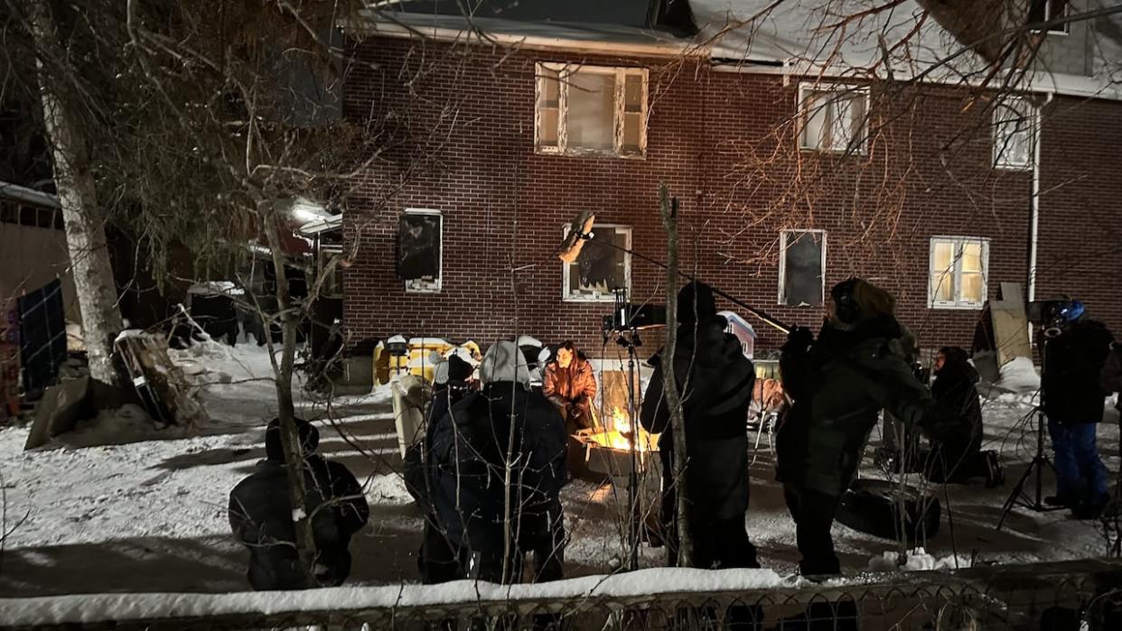 On a cold night in Winnipeg's north end, the cast and crew of many wounds were hard at work.  (Gavin Axelrod/CBC - image credit)