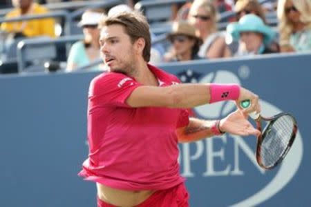 Stan Wawrinka of Switzerland returns a shot to Daniel Evans of the United Kingdom on day six of the 2016 U.S. Open tennis tournament at USTA Billie Jean King National Tennis Center. Mandatory Credit: Anthony Gruppuso-USA TODAY Sports