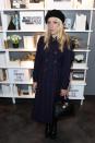 <p>Chloë Sevigny adds vintage swagger to her midi-length coat with a beret and top-handle bag.</p> <h4>Getty Images</h4>
