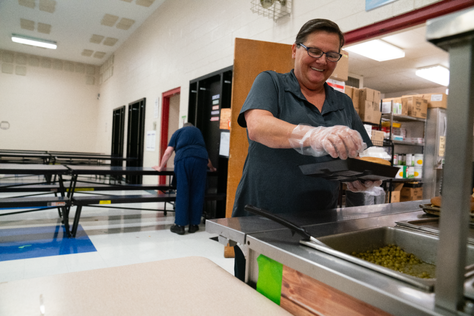 Cafeteria employee Shelly Howell prepares children’s lunches at Renfro Elementary in Collinsville, Ill. on Aug. 28, 2023. Collinsville District 10 is one out of 18 public school districts in the metro-east providing free breakfast and lunches to all students.