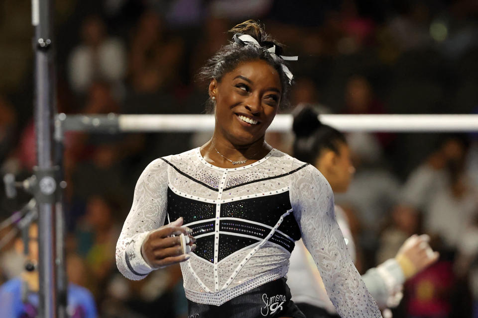 Aug 5, 2023; Hoffman Estates, Illinois, USA; Simone Biles reacts while warming up before the Core Hydration Classic at NOW Arena. Mandatory Credit: Jon Durr-USA TODAY Sports