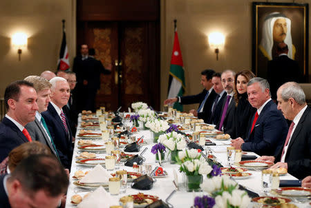 Jordan's King Abdullah and wife Queen Rania, meet with U.S. Vice President Mike Pence and wife Karen Pence, at the Royal Palace in Amman, Jordan January 21, 2018. REUTERS/Muhammad Hamed