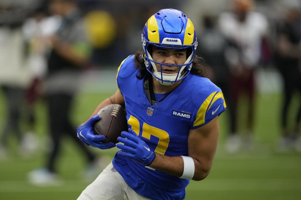 Los Angeles Rams wide receiver Puka Nacua warms up before a game against the Washington Commanders Sunday, Dec. 17, 2023, in Inglewood, Calif. | Marcio Jose Sanchez, Associated Press