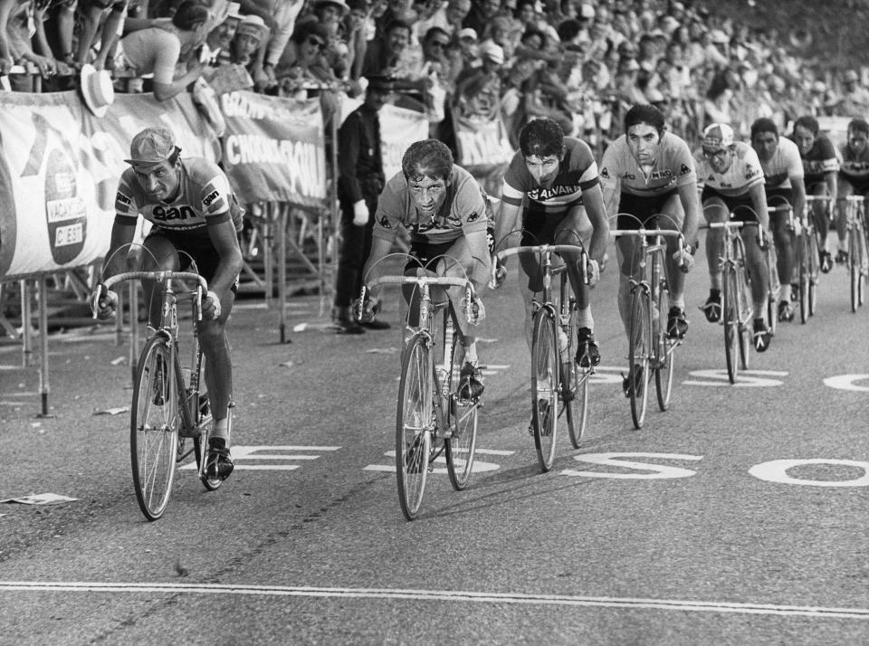 FILE - In this July 18, 1972 file photo, cyclists (from left to right) Raymond Poulidor, France, Cyrille Guimard, France, Felice Gimondi, Italy , Eddy Merckx, Belgium and Julio Jimenez, Spain, lead the pack during the 14. stage of the Tour de France cycling race from Valloire-Le Galibier to Aix les Bains. Tour de France organizers have confirmed that former rider Raymond Poulidor, known as "the eternal runner-up" behind five-time winners Jacques Anquetil and Eddy Merckx, has died. He was 83 years old.( AP Photo, File)