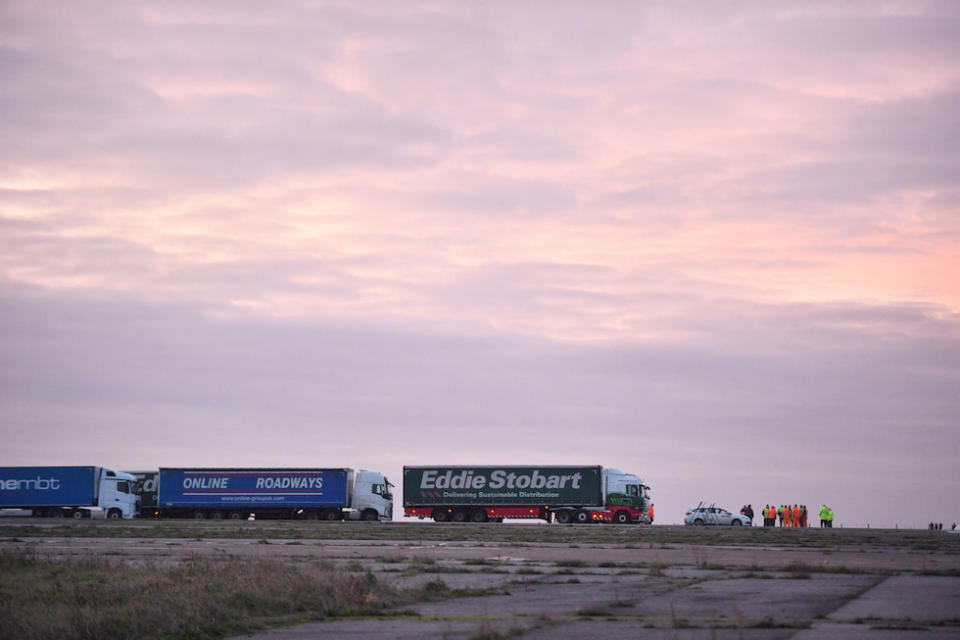 Lorries begin to line up during a trial at the former Manston Airport site in Kent of a government plan to hold lorries in the event of post-Brexit disruption at the channel ports (Picture: PA)