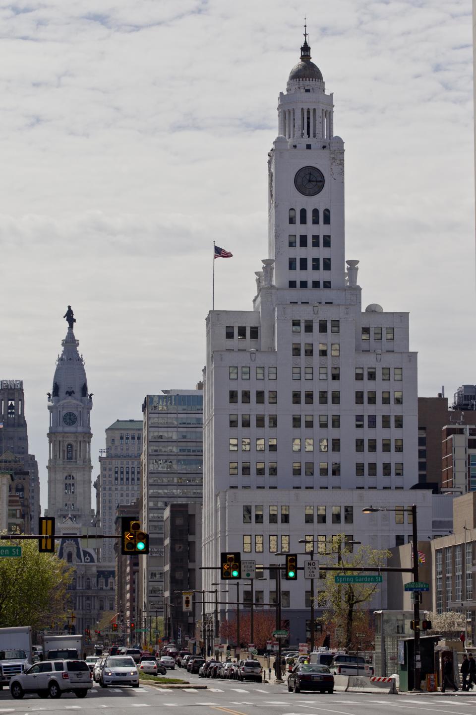 The Philadelphia Inquirer and Daily News building, right, stands in view of City Hall, Friday, March 30, 2012, in Philadelphia. H.F. "Gerry" Lenfest is leading a group several local businessmen that are trying to close a deal to buy The Philadelphia Inquirer and Philadelphia Daily News from New York hedge funds. (AP Photo/Matt Rourke)