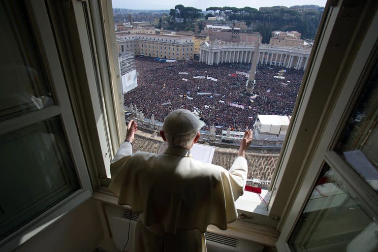 Pope Benedict XVI's leads the Angelus prayer from the window of his apartments on February 24, 2013 at the Vatican. Swirling intrigue has overshadowed the run-up to a conclave to elect a new pope, and campaigners are calling for cardinals implicated in cover-ups of child sex abuse scandals to be barred from voting