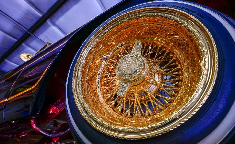 This is a custom engraved wheel on a 1962 Chevy Impala. Steven Burk has been painting since he was 8-years-old and has been running his own custom shop, SNK Autobody & Hydraulics, for about 20 years.