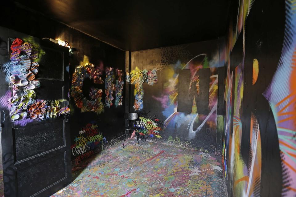 A bedroom painted by French street artist Nebay is seen at the street art project tower "Paris Tour 13" in Paris