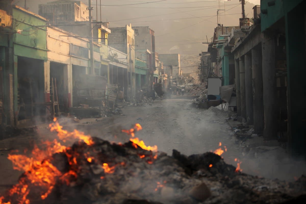 Destroyed street after an earthquake in Haiti. 'Paths to disaster are not limited to the impacts of high temperatures', the team warned (Getty)