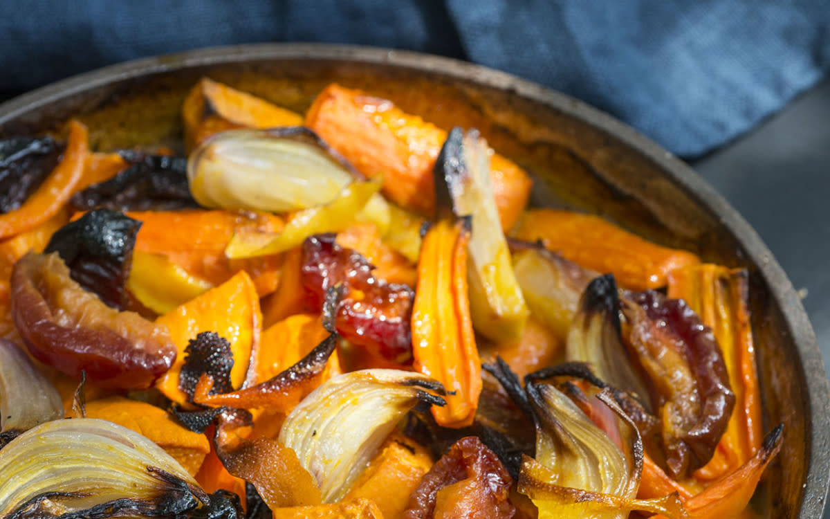 <p>Parade</p><p>In Yiddish, the word tzimmes means “a big fuss,” probably because of all the work required to make the old-style dish. This version couldn’t be easier.</p><p><a href="/422076/parade/roasted-carrot-and-sweet-potato-tzimmes/" data-ylk="slk:Click here to get the recipe for Roasted Carrot and Sweet Potato Tzimmes;elm:context_link;itc:0;sec:content-canvas" class="link rapid-noclick-resp"><strong>Click here to get the recipe for Roasted Carrot and Sweet Potato Tzimmes</strong></a></p>