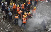 Rescue crews search for survivors at the site of a collapsed residential building in Mumbai September 27, 2013.( REUTERS/Danish Siddiqui)