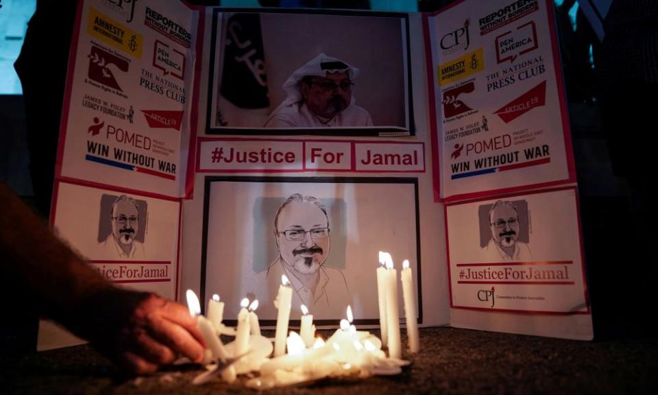 The Committee to Protect Journalists and other press freedom activists hold a vigil outside the Saudi embassy in Washington to mark the anniversary of the killing of Jamal Khashoggi.