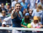 Sep 5, 2016; New York, NY, USA; Simona Halep of Romania celebrates after recording match point against Carla Suarez Navarro of Spain on day eight of the 2016 U.S. Open tennis tournament at USTA Billie Jean King National Tennis Center. Mandatory Credit: Jerry Lai-USA TODAY Sports