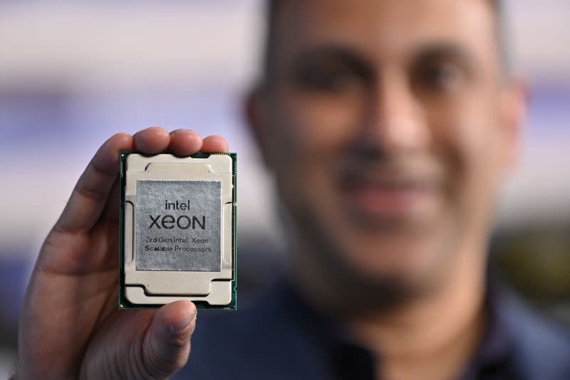 Handout photo of Navin Shenoy, executive vice president and general manager of the data platforms group at Intel Corp, holding one of the company's "Ice Lake" data center chips