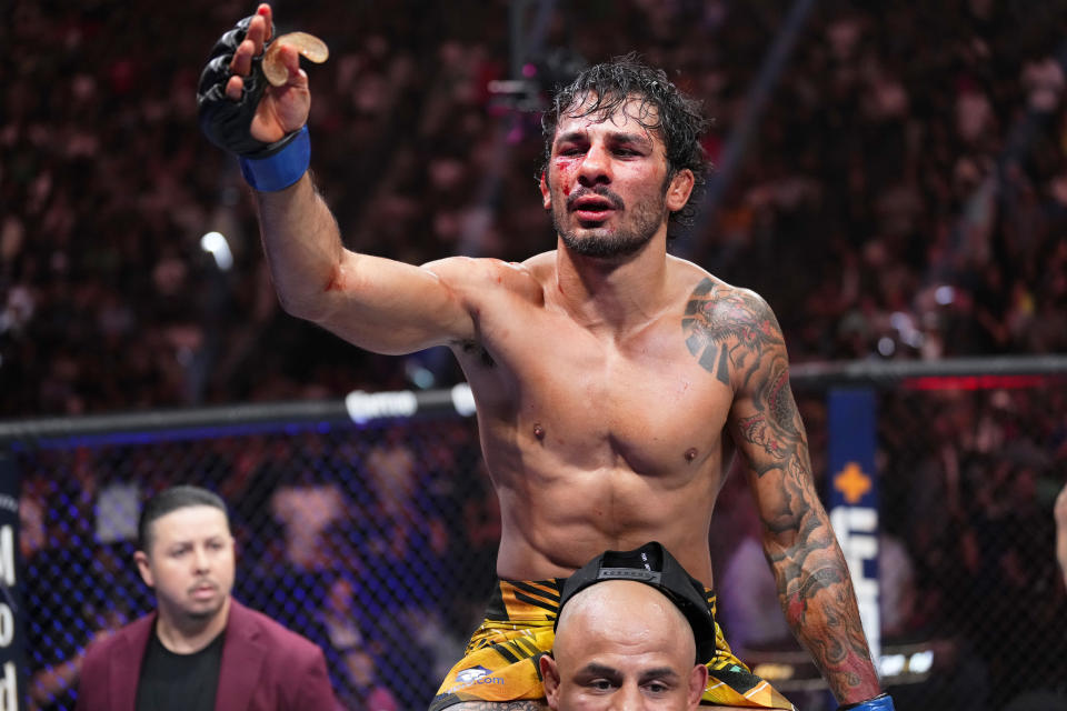 Alexandre Pantoja of Brazil reacts to the finish of his UFC flyweight championship fight win over Brandon Moreno at UFC 290 on July 08, 2023 in Las Vegas, Nevada. (Jeff Bottari/Zuffa LLC via Getty Images)