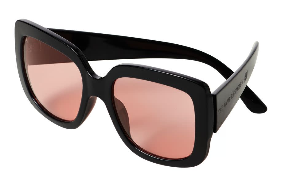 <p>Square lens sunglasses, £17.99, H&M</p><p><a class="link " href="https://go.redirectingat.com?id=127X1599956&url=https%3A%2F%2Fwww2.hm.com%2Fen_gb%2Fproductpage.0946957001.html&sref=https%3A%2F%2Fwww.cosmopolitan.com%2Fuk%2Ffashion%2Fstyle%2Fg34287086%2Fhandm-the-vampires-wife%2F" rel="nofollow noopener" target="_blank" data-ylk="slk:SOLD OUT;elm:context_link;itc:0;sec:content-canvas">SOLD OUT</a></p><p>The 70s shaped specs bode nicely with the billowy bell sleeves and pussy bow neck ties within the collection. </p>