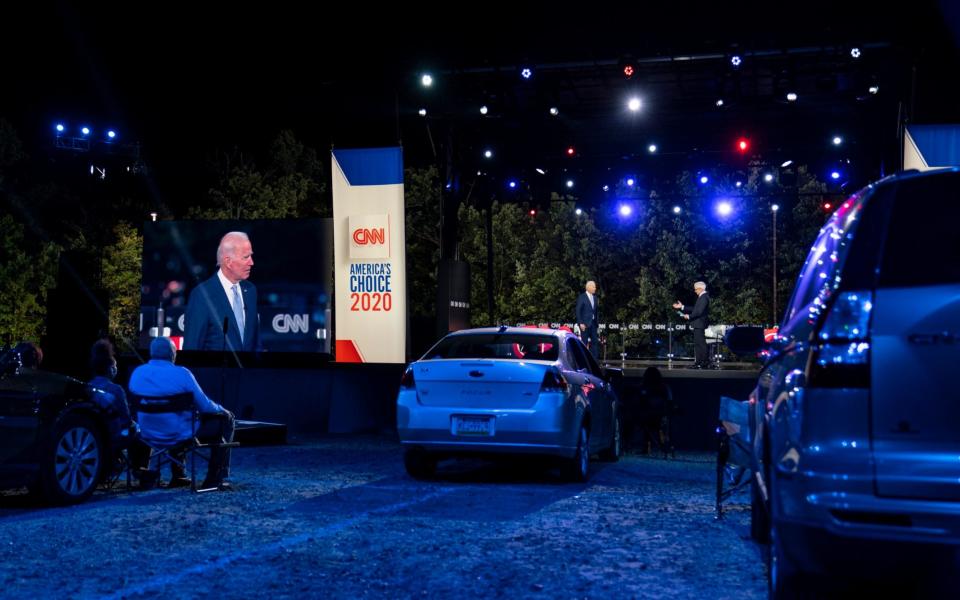 Joe Biden participates in a CNN drive-in town hall moderated by Anderson Cooper - AP