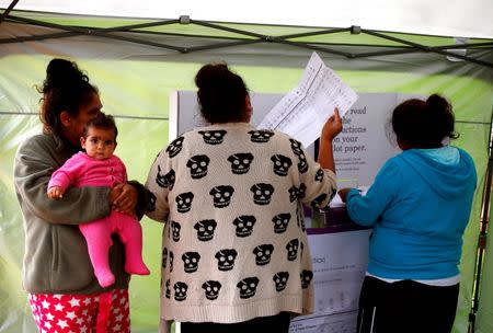 Aboriginal women vote in a remote voting station in the western New South Wales outback town of Enngonia, Australia, June 22, 2016. REUTERS/David Gray