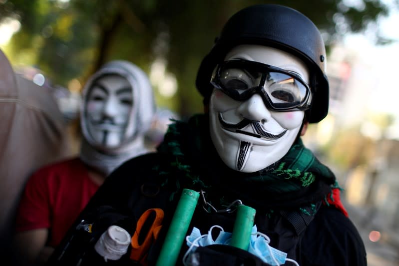 Iraqi demonstrators are seen during the ongoing anti-government protests in Baghdad