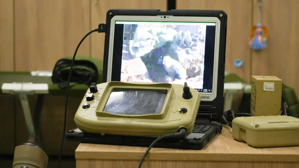 A laptop shows a video clip of a Russian soldier targeted by an American-made Switchblade 300 drone, in eastern Ukraine. The video clip is not dated. Photo was taken Feb. 11, 2023.