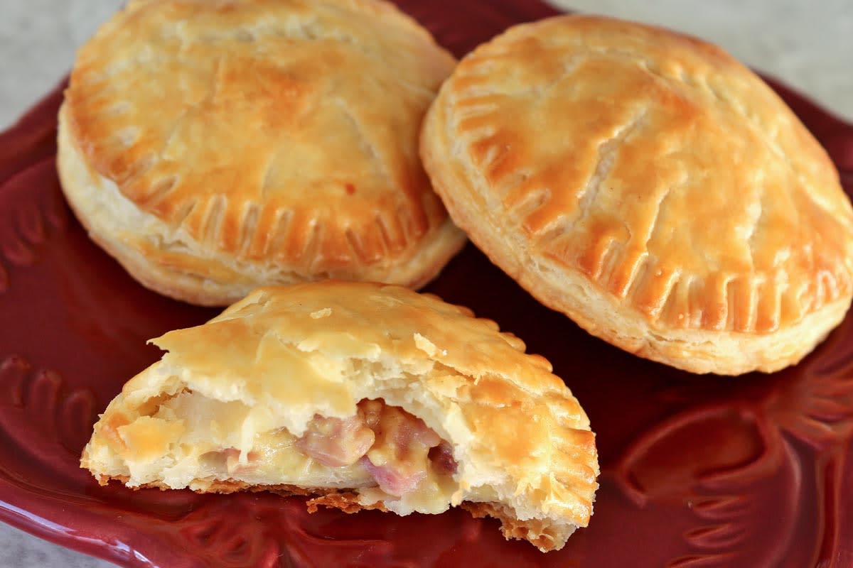 <p>Mission Food Adventure</p><p>Filled with a creamy cheese filling studded with smoky bites of ham.</p><p><strong>Get the recipe:</strong> <a href="https://mission-food.com/ham-and-cheese-empanadas/" rel="nofollow noopener" target="_blank" data-ylk="slk:Ham and Cheese Empanadas;elm:context_link;itc:0;sec:content-canvas" class="link rapid-noclick-resp">Ham and Cheese Empanadas</a></p>