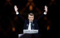 French President-elect Emmanuel Macron celebrates on the stage at his victory rally near the Louvre in Paris, France May 7, 2017. REUTERS/Christian Hartmann