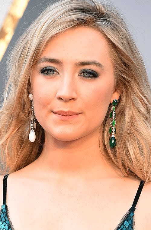 The actress looked drop dead gorgeous in mismatched green and white Chopard drop earrings, featuring pearls, 18 carats of emeralds, nearly six carats of jadeites and 3.25-carats of diamonds set in white gold.