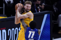 Brooklyn Nets guard Kyrie Irving guards Indiana Pacers forward Domantas Sabonis during the first half of basketball's NBA All-Star Game in Atlanta, Sunday, March 7, 2021. (AP Photo/Brynn Anderson)