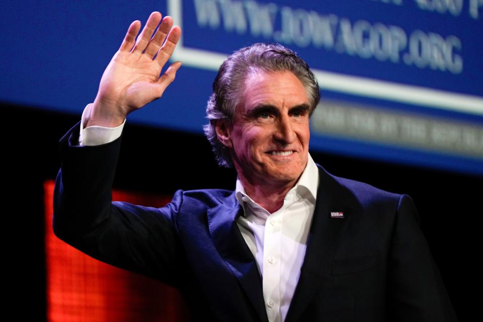 Republican presidential candidate North Dakota Gov. Doug Burgum waves at the Republican Party of Iowa's 2023 Lincoln Dinner in Des Moines, Iowa, Friday, July 28, 2023.