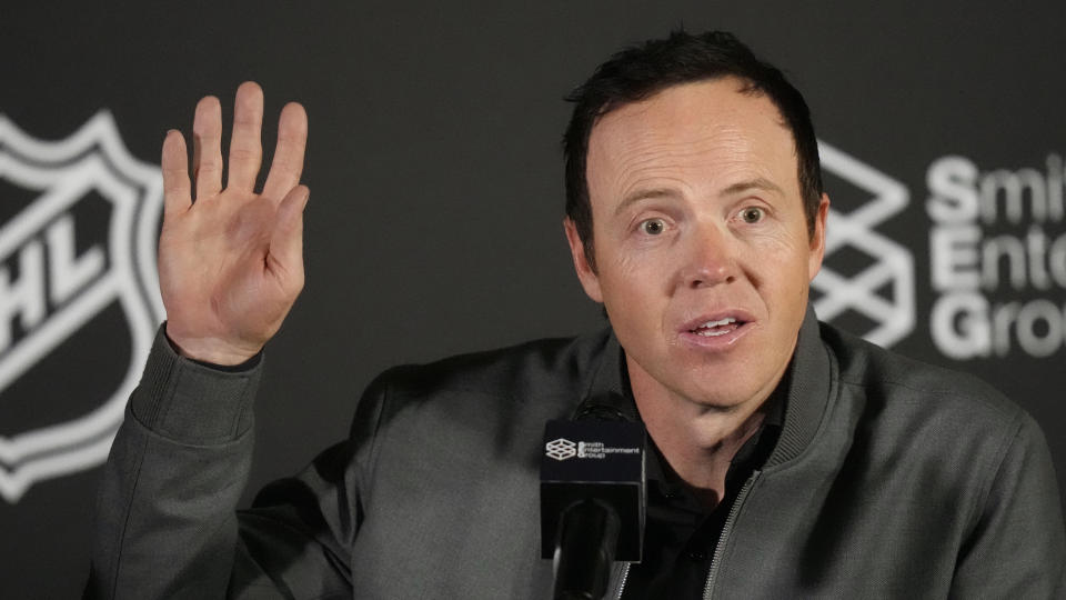 Ryan Smith, co-founder and chairman of Smith Entertainment Group, speaks during a news conference Friday, April 19, 2024, in Salt Lake City about the move of the Arizona Coyotes franchise to Utah. (AP Photo/Rick Bowmer)