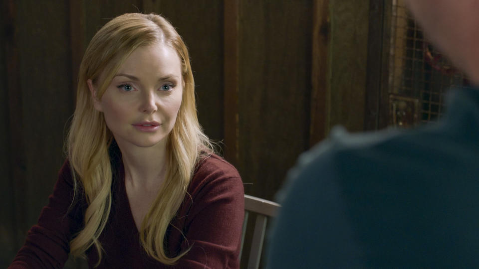 Izabella Miko speaks to someone