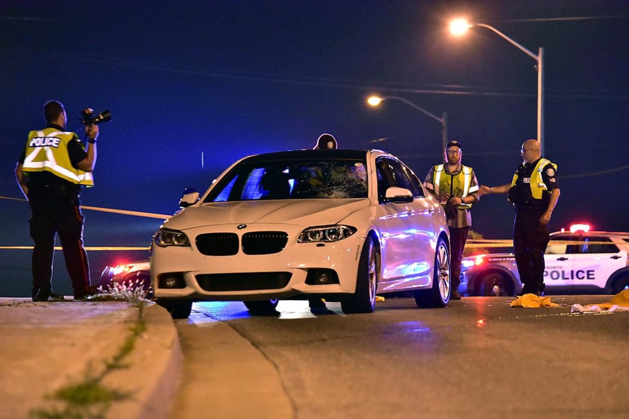 On Friday, Toronto police were called to the area of Warden Avenue and Ellesmere Road shortly before 10:20 p.m. for report of a pedestrian who had been hit by a vehicle. The pedestrian was pronounced dead at the scene.  (CBC - image credit)