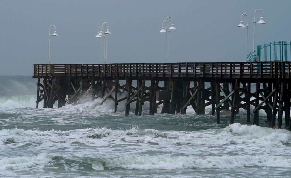 Surf hits the Main Street Pier in Daytona Beach as the effects of Hurricane Idalia reached Daytona Beach.