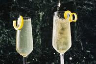 <p>The French 75 is among the fanciest of cocktails. Sure, there’s the tried-and-true <a href="https://www.delish.com/cooking/recipe-ideas/a20139300/best-classic-margarita-recipe/" rel="nofollow noopener" target="_blank" data-ylk="slk:margarita" class="link ">margarita</a> and the timeless <a href="https://www.delish.com/cooking/recipe-ideas/recipes/a9882/old-fashioned-recipe/" rel="nofollow noopener" target="_blank" data-ylk="slk:Old Fashioned" class="link ">Old Fashioned</a>, but the French 75 has got what those two don’t: Champagne! <a href="https://www.delish.com/holiday-recipes/valentines-day/a45425/our-champagne-cheat-sheet-is-all-you-need-to-survive-nye/" rel="nofollow noopener" target="_blank" data-ylk="slk:Champagne" class="link ">Champagne</a> is what makes this drink distinctively French (and totally worth the splurge), but a more affordable sparkling wine such as <a href="https://www.delish.com/entertaining/wine/g32870025/best-prosecco-brands/" rel="nofollow noopener" target="_blank" data-ylk="slk:Prosecco" class="link ">Prosecco</a> or Cava are both sound options. Make sure to squeeze the lemon twist into your drink to add some of those floral lemon oils.<br><br>Get the <strong><a href="https://www.delish.com/cooking/recipe-ideas/a38848982/french-75-cocktail/" rel="nofollow noopener" target="_blank" data-ylk="slk:French 75 recipe" class="link ">French 75 recipe</a></strong>. </p>