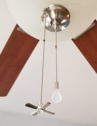 A pair of beaded fan pull extenders