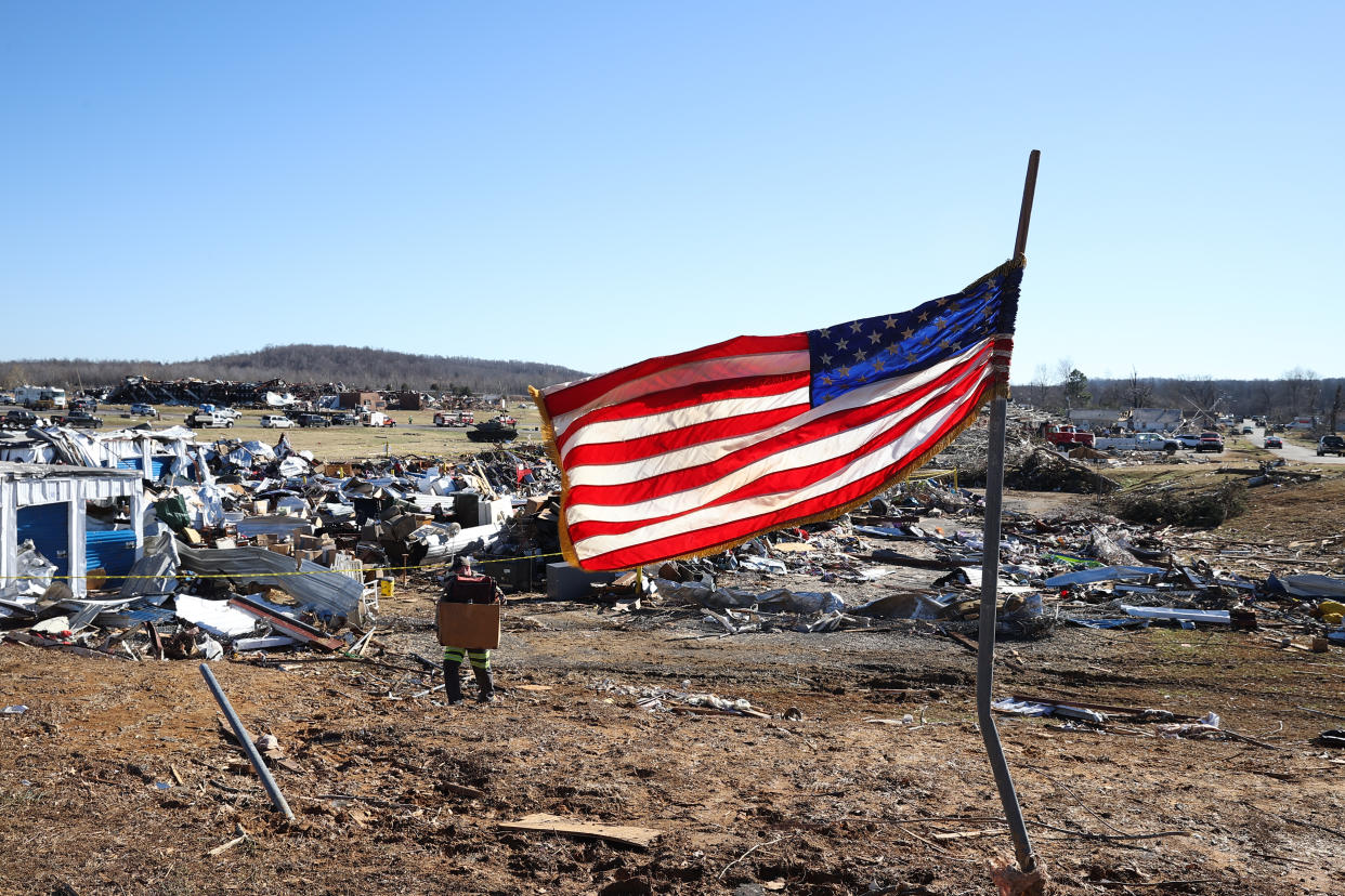 KENTUCKY, UNITED STATES - DECEMBER 13: People are seen amid rubbles after tornadoes hit Dawson Springs, Kentucky, United States on December 13, 2021. (Photo by Tayfun Coskun/Anadolu Agency via Getty Images)