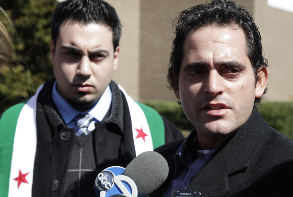 Malek Jandali, a Syrian American from Atlanta, talks with reporters after attending the funeral service for journalist Marie Colvin, Monday, March 12, 2012 at St. Dominic Roman Catholic Church in Oyster Bay, N.Y. The 56-year-old Colvin was a longtime reporter for Britain's Sunday Times. She and French photographer Remi Ochlik were killed Feb. 22 in shelling in Homs, Syria. Jandali, who says he did not know Colvin, attended the funeral to pay his respects and to denounce the Syrian government. (AP Photo/Mark Lennihan)